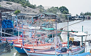 The fresh fish market bridge is the port of the seafood market and a lot of fishermen and fishing boats