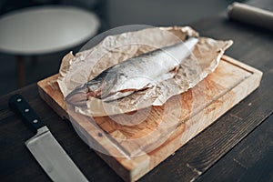 Fresh fish preparation on cutting board, closeup