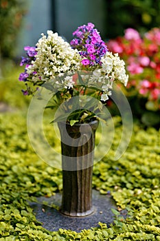 Fresh flower decoration on a grave