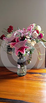 fresh flowers beautifully orchestrated in a clear glass vase
