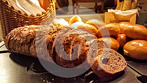 Fresh fragrant bread with black sesame on the table. a traditional breakfast food concept