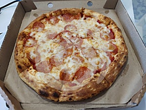 fresh fragrant pizza stuffed with cheese and sausage