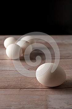 Fresh free range eggs on wooden table