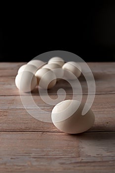 Fresh free range eggs on wooden table