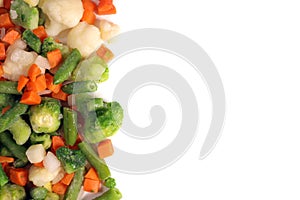 fresh frozen vegetables including broccoli, celera, onion, broccoli on white background photo