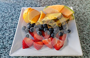 Fresh fruit appetizer on a rectangular platter