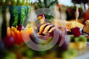 Fresh fruit arrangement with watermelon, apple and grapes