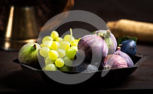 Fresh fruit in a bowl against rustic background