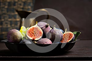 Fresh fruit in a bowl against rustic background