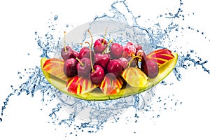 Fresh fruit on creative splash water in isolated background