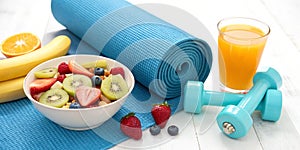 Fresh Fruit Juice and Fitness Accessories. Healthy Lifestyle Concept photo