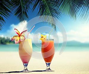 Fresh fruit juices on a beach