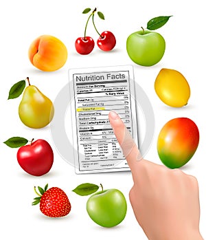 Fresh fruit with a nutrition facts label and hand.