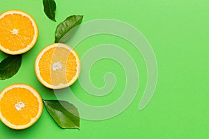 fresh Fruit orange slices on colored background. Top view. Copy Space. creative summer concept. Half of citrus in