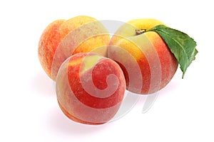 Fresh fruit - Peaches isolated on white background