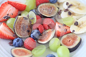 Fresh fruit plate with figs and berries