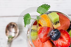 Fresh fruit salad in glass. Close up