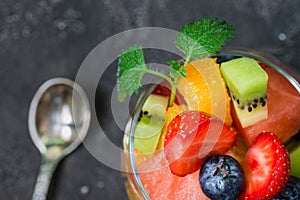 Fresh fruit salad in glass. Top view