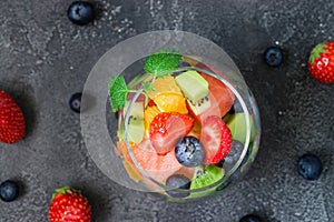 Fresh fruit salad in glass. Top view