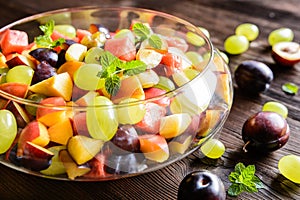 Fresh fruit salad with watermelon, plums, nectarines and grape