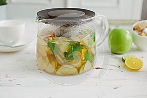 Fresh fruit tea mint apples orange