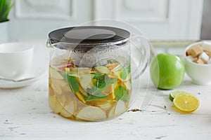 Fresh fruit tea mint apples orange