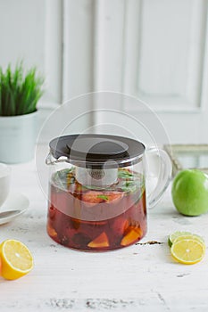 Fresh fruit tea mint apples orange