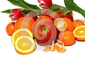 fresh fruit and tulips isolated on white