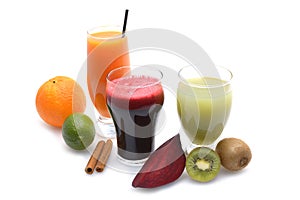 Fresh fruit and vegetable juices on white background