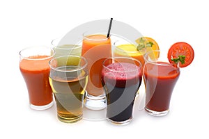 Fresh fruit and vegetable juices on white background