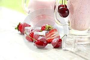 Fresh fruit yogurt with cherries and strawberries
