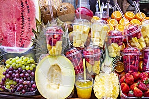 Fresh fruits background.Healthy eating, dieting concept, clean eating. Various freshly squeezed fruits and vegetables juices