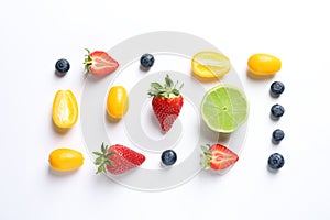 Fresh fruits and berries on white background,