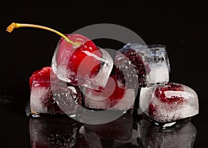 Fresh fruits frozen in ice cubes