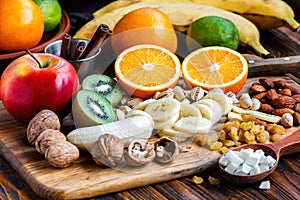 Fresh fruits. Healthy food. Mixed fruits and nuts background.Healthy eating, dieting, love fruits.
