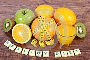 Fresh fruits, juice and tape measure, healthy lifestyles and nutrition