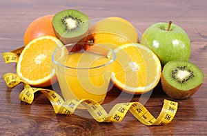 Fresh fruits, juice and tape measure, healthy lifestyles and nutrition