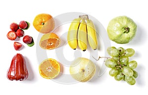 Fresh fruits in raws on white background. Red, orange, yellow and green. Food ingredients