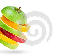 Fresh fruits. Stack of apple and orange slices on white