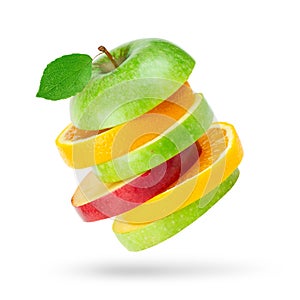 Fresh fruits. Stack of apple and orange slices on white