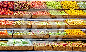 Fresh fruits and vegetables on shelf in supermarket