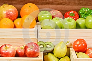 Fresh fruits and vegetables in woodem container