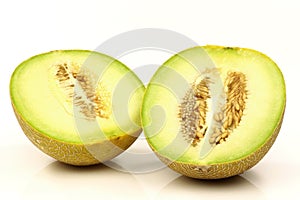 Fresh galia melon halves photo