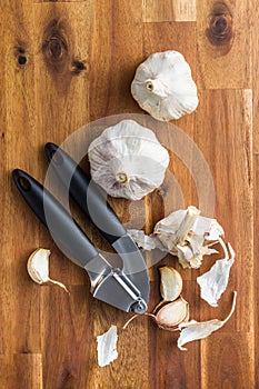 Fresh garlic and garlic presser.