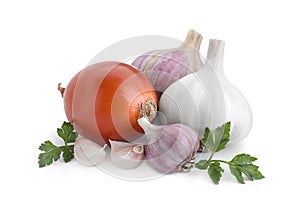 Fresh garlic, onions and parsley isolated on white