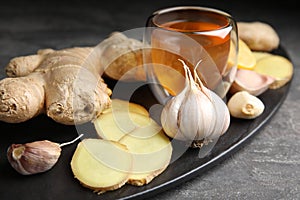 Fresh garlic and other natural cold remedies on table