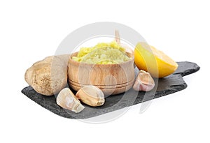 Fresh garlic and other natural cold remedies isolated on white