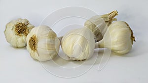 fresh garlic on a white isolated surface