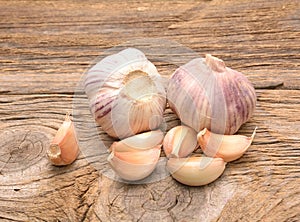 Fresh garlic on wooden background