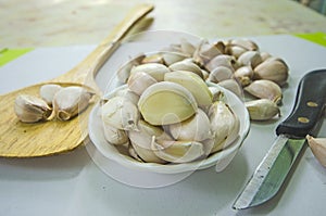 Fresh garlics in and out cup for Asian food cooking